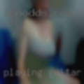 Playing guitar woman
